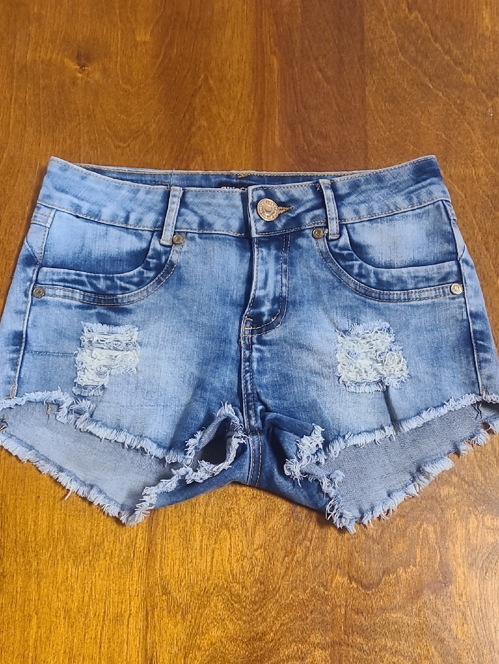 Women's Distressed Light Blue Denim Jean Shorts